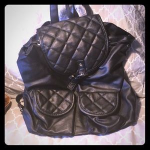 Black faux leather backpack